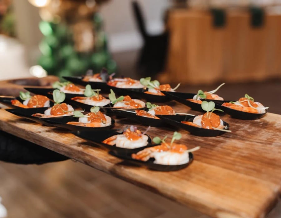 Smoked salmon canapés plated on slate