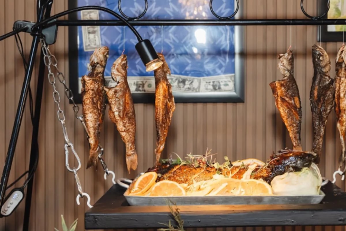 Alpha Katering's signature hanging salmon display